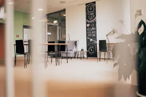 Overview of a room containing several workstations